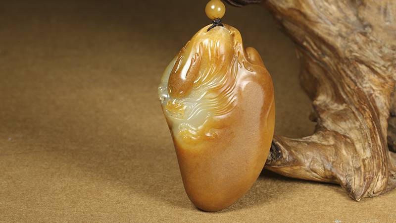 一抹红皮万两金，一种贵得离谱的红皮籽料！和田玉鉴定保养知识大全-藏