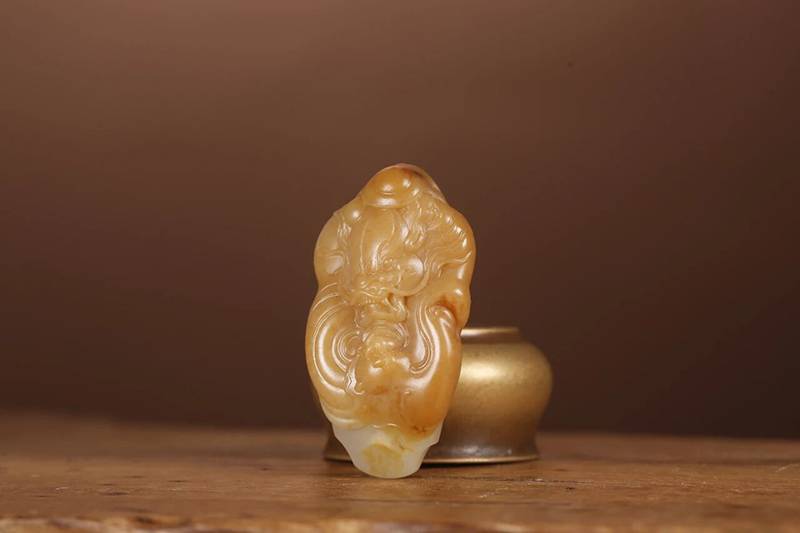 和田玉手把件怎么选？